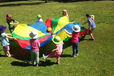 Nine children with parachute