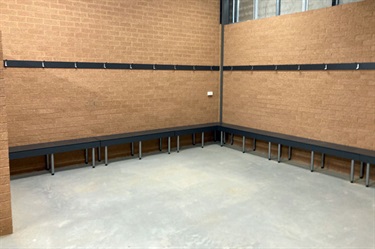 Loads of bench seating and hooks to hang clothing in the change rooms