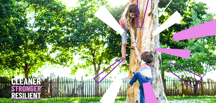 Photo of two children climbing up the trunk of a tree, one is helping the other up. Image branded with council's burst logo and text 