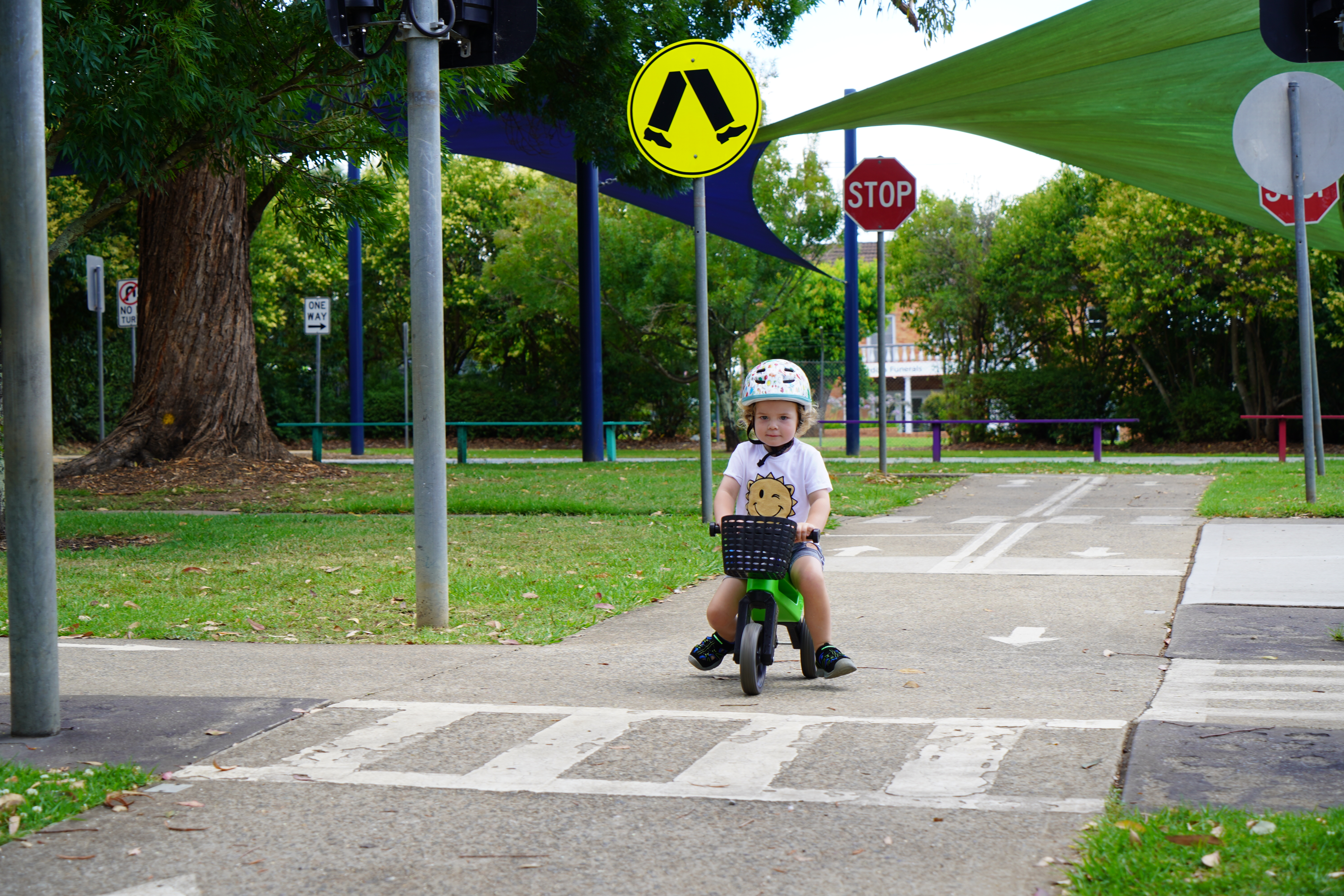 Child riding bike at education centre