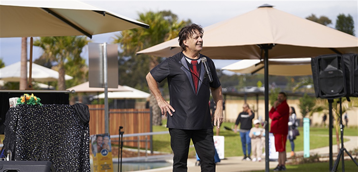 A magician performing at the Billabong Parklands